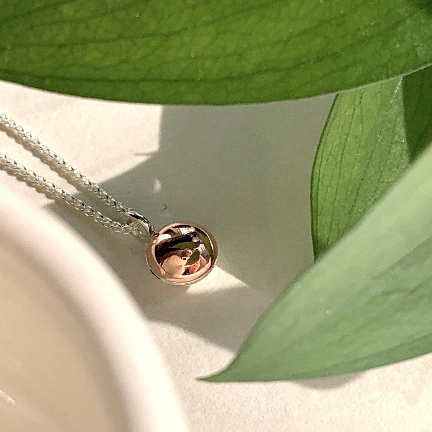 Silver and Copper Round Pendant