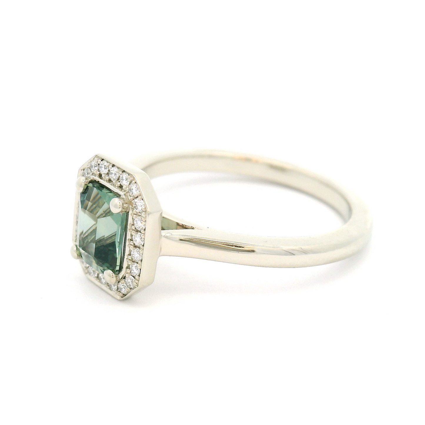 14k White Engagement Ring with 0.87ct Teal Sapphire and Accent Diamond Halo