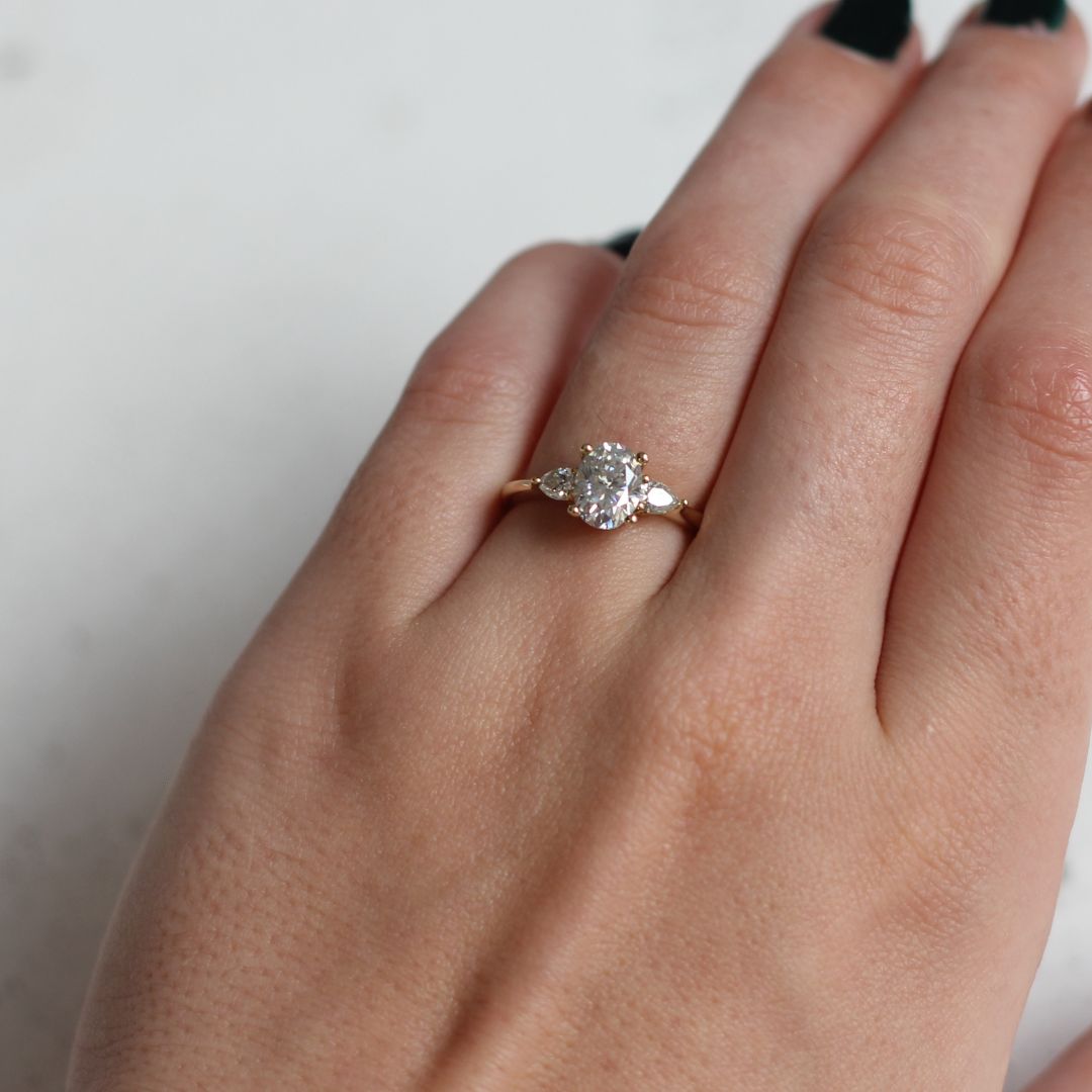 14k Yellow Oval Moissanite Three Stone Engagement Ring