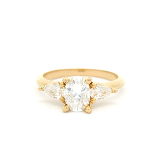 14k Yellow Three Stone Moissanite Ring with Oval Centre and Pear Sides