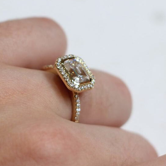 14k Yellow Moissanite Emerald Cut East-West Halo Engagement Ring