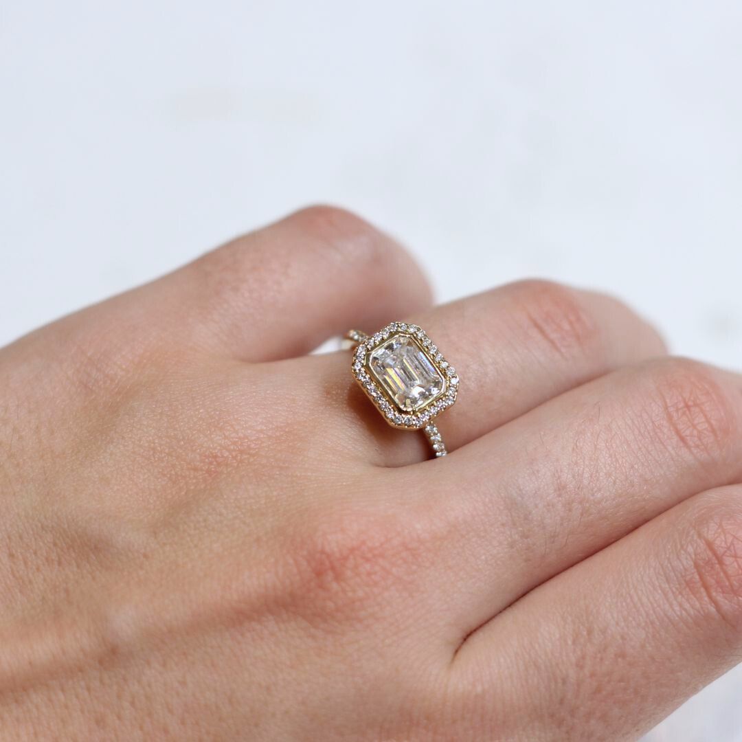 14k Yellow Moissanite Emerald Cut East-West Halo Engagement Ring