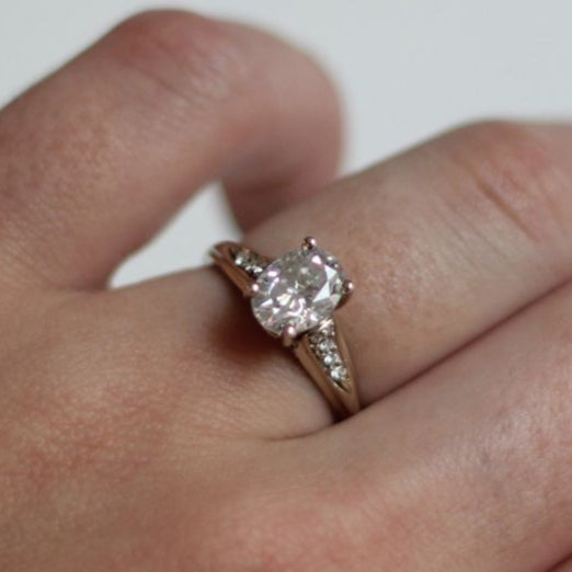Oval Moissanite and Diamond Detail Engagement Ring