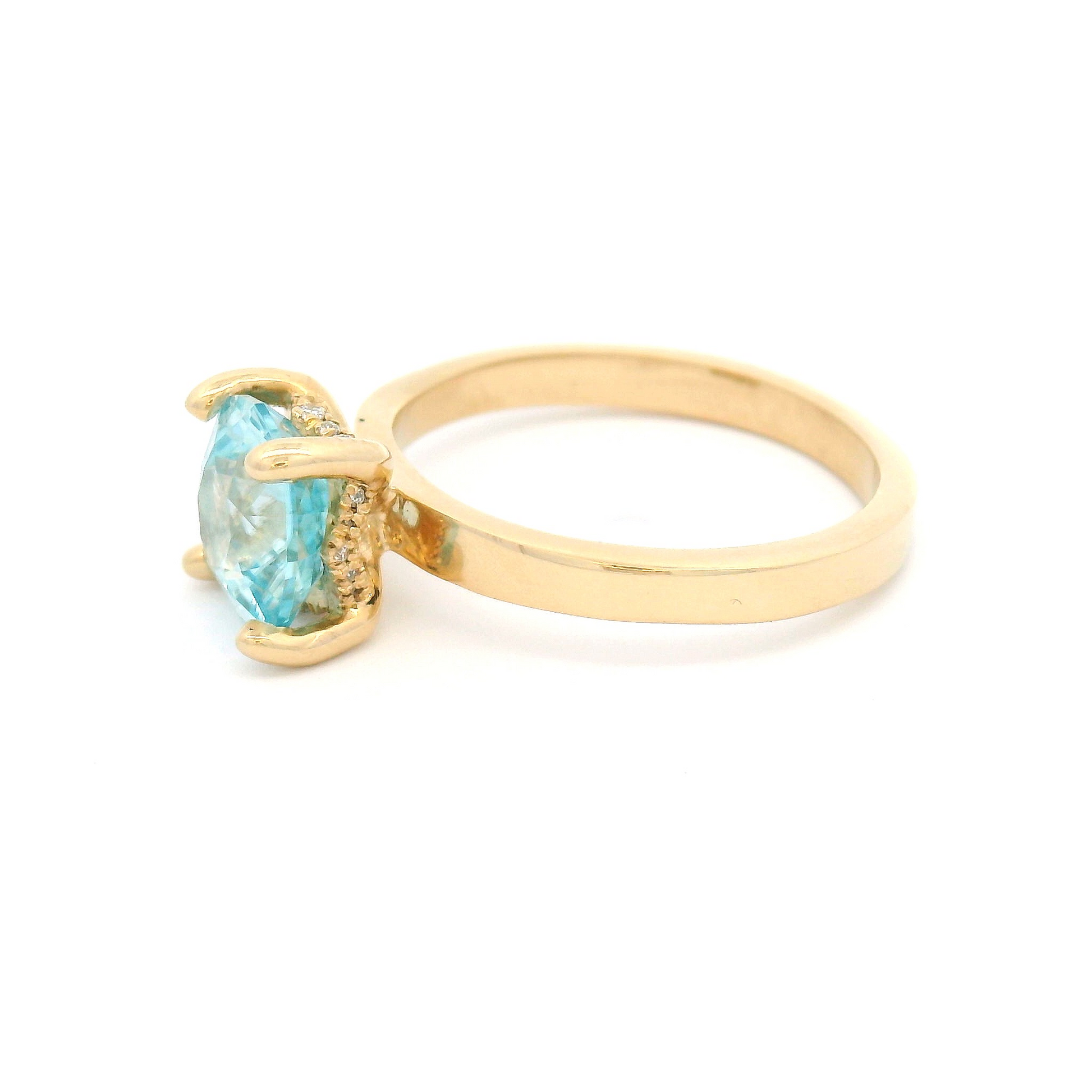 14k Yellow Solitaire with 2.64ct Blue Zircon and Hidden Accent Diamonds