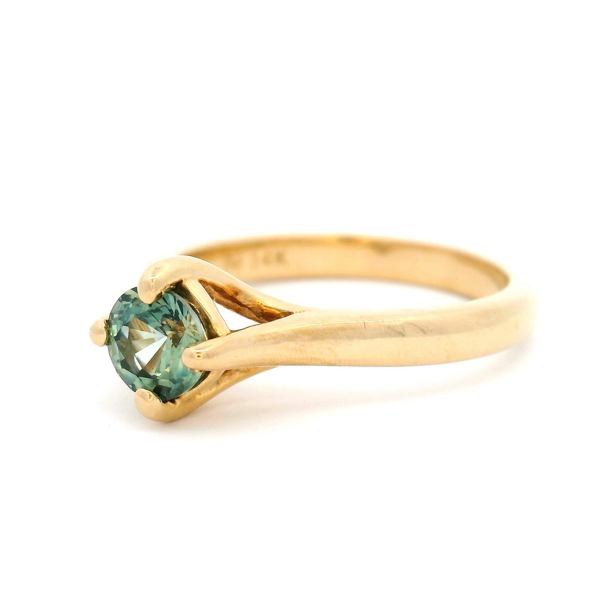 14k Yellow Solitaire set with 0.58ct Teal Sapphire