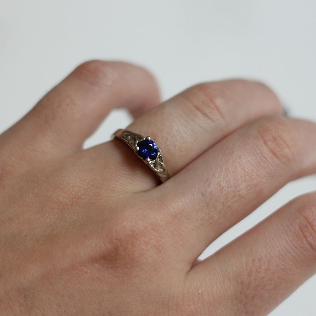 14k White Celtic Knot Solitaire set with 0.55ct Blue Sapphire