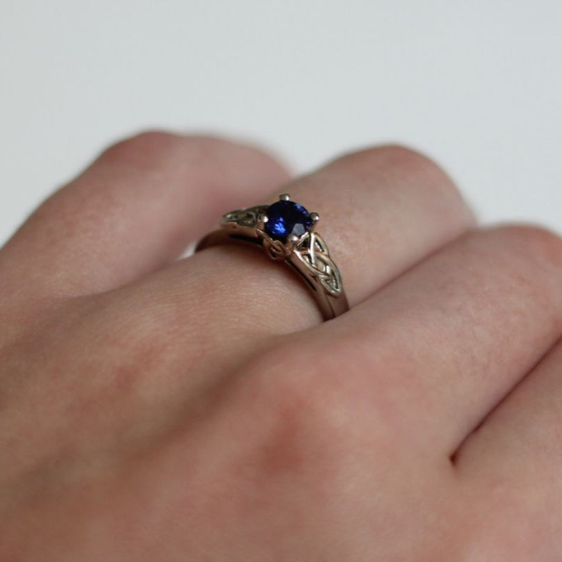 14k White Celtic Knot Solitaire set with 0.55ct Blue Sapphire