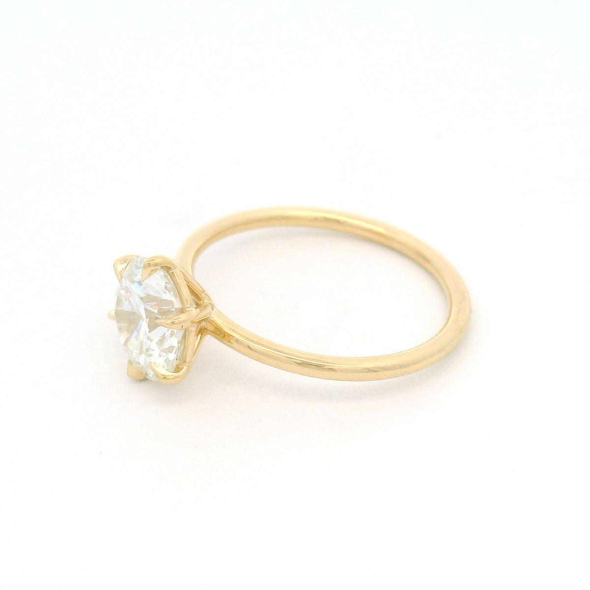 14K yellow gold handmade solitaire engagement ring with a 2.01ct (8.1mm) round brilliant-cut lab-grown diamond in a six-prong setting.