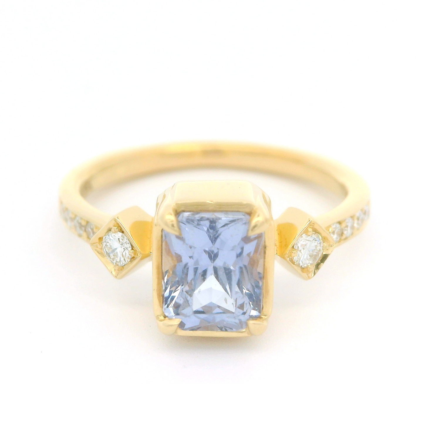 18k yellow ring 1.55ct lavender sapphire and accent diamonds.
