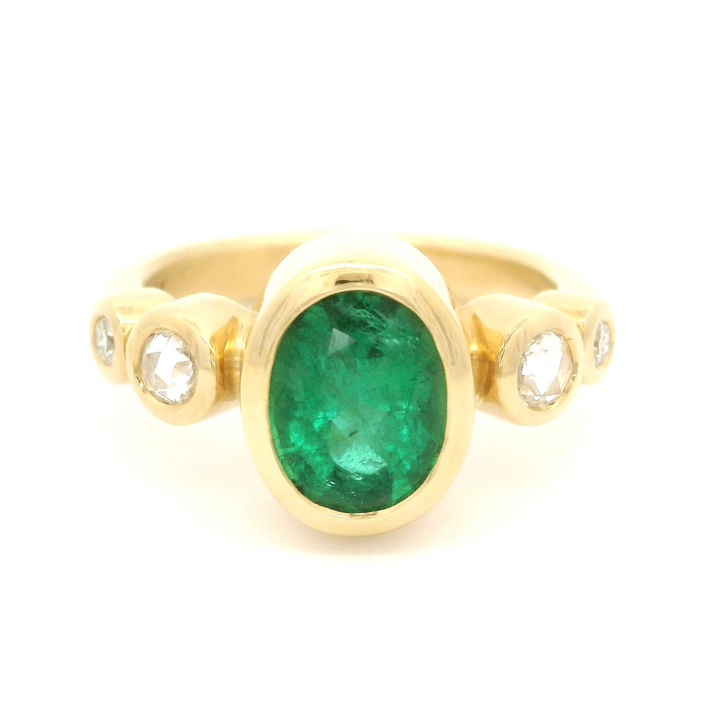18k yellow gold ring with 1.70ct natural oval emerald and accent diamonds.