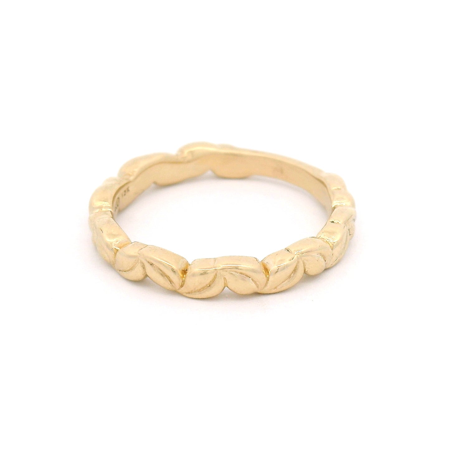 10K yellow gold 3mm wedding band with an intricately carved leaf pattern and nature-inspired botanical detailing.