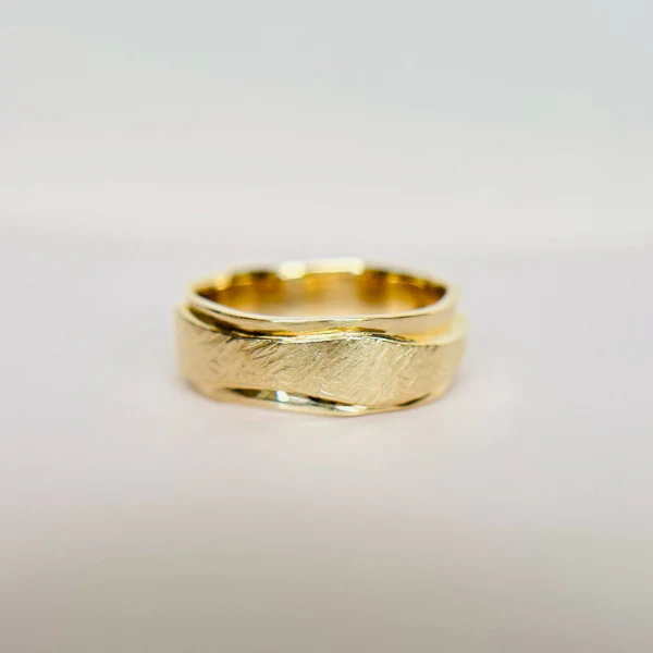 14k Yellow Gold Band Hand Carved with Textured Ribbon.