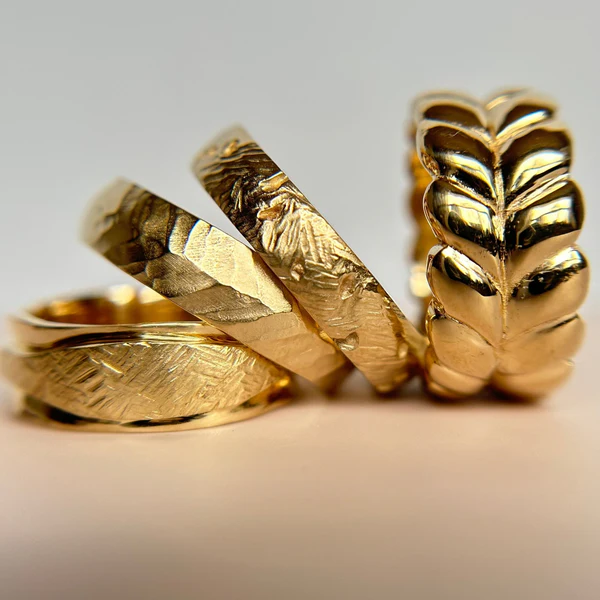 14k Yellow Gold Band Hand Carved with Braided Design. Grouped with other carved bands.