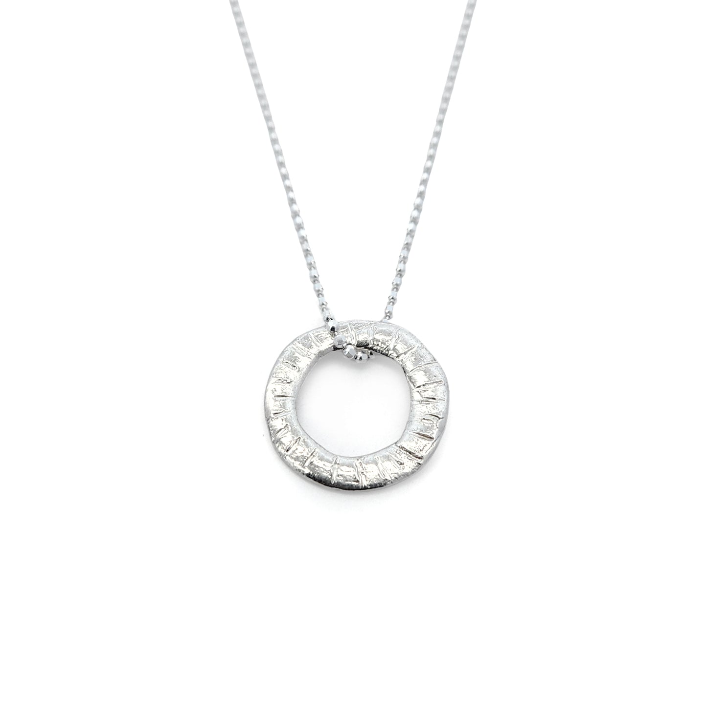 Organic Silver Notched Donut Pendant Necklace