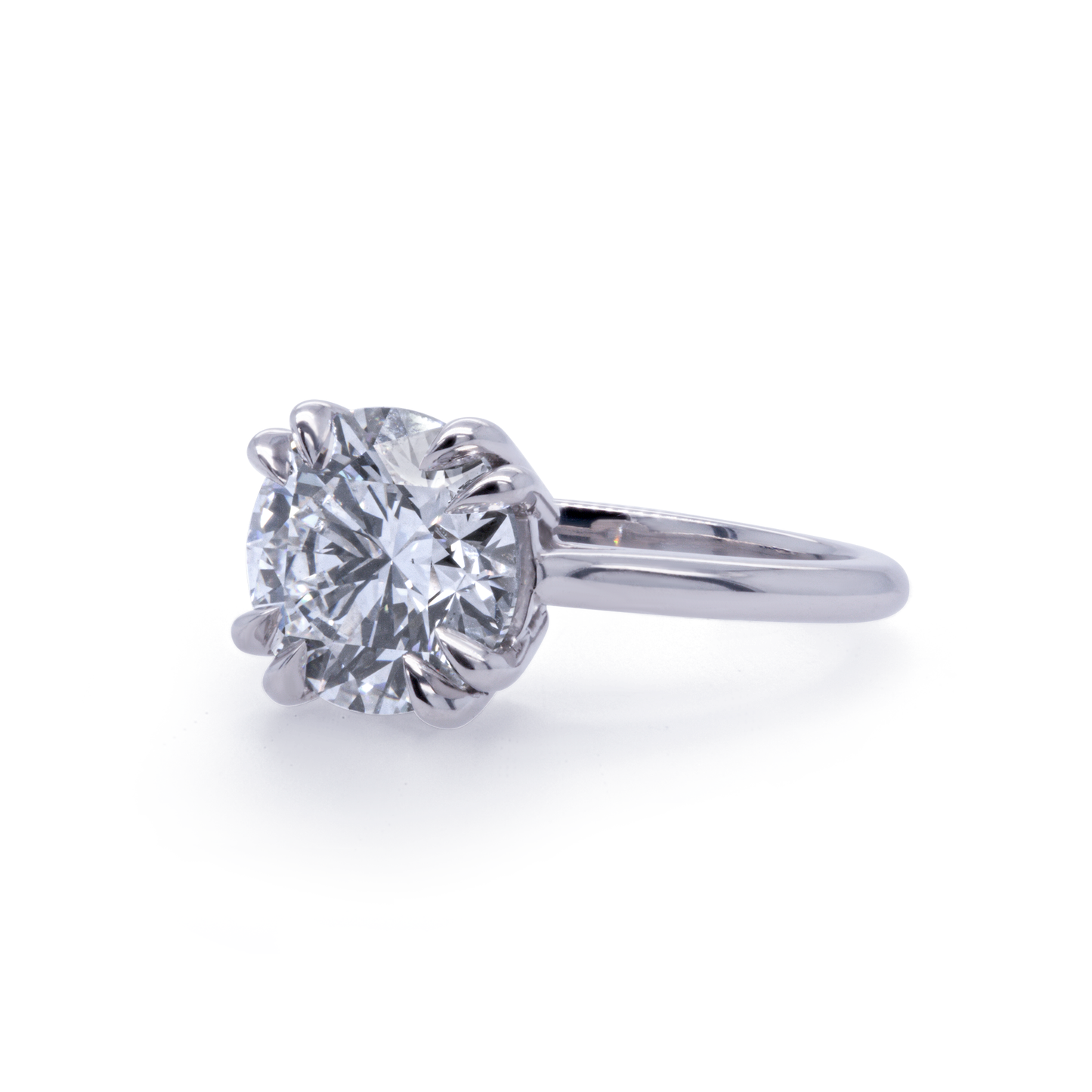 Platinum Solitaire with 3ct Lab-Grown Round Brilliant Cut Diamond and Hidden Accent Lab Diamonds