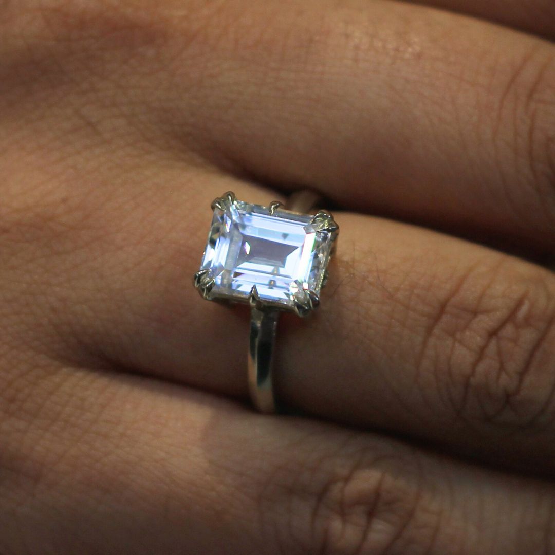 10k White Solitaire with 2.8ct Emerald-Cut White Sapphire and Accent Diamonds