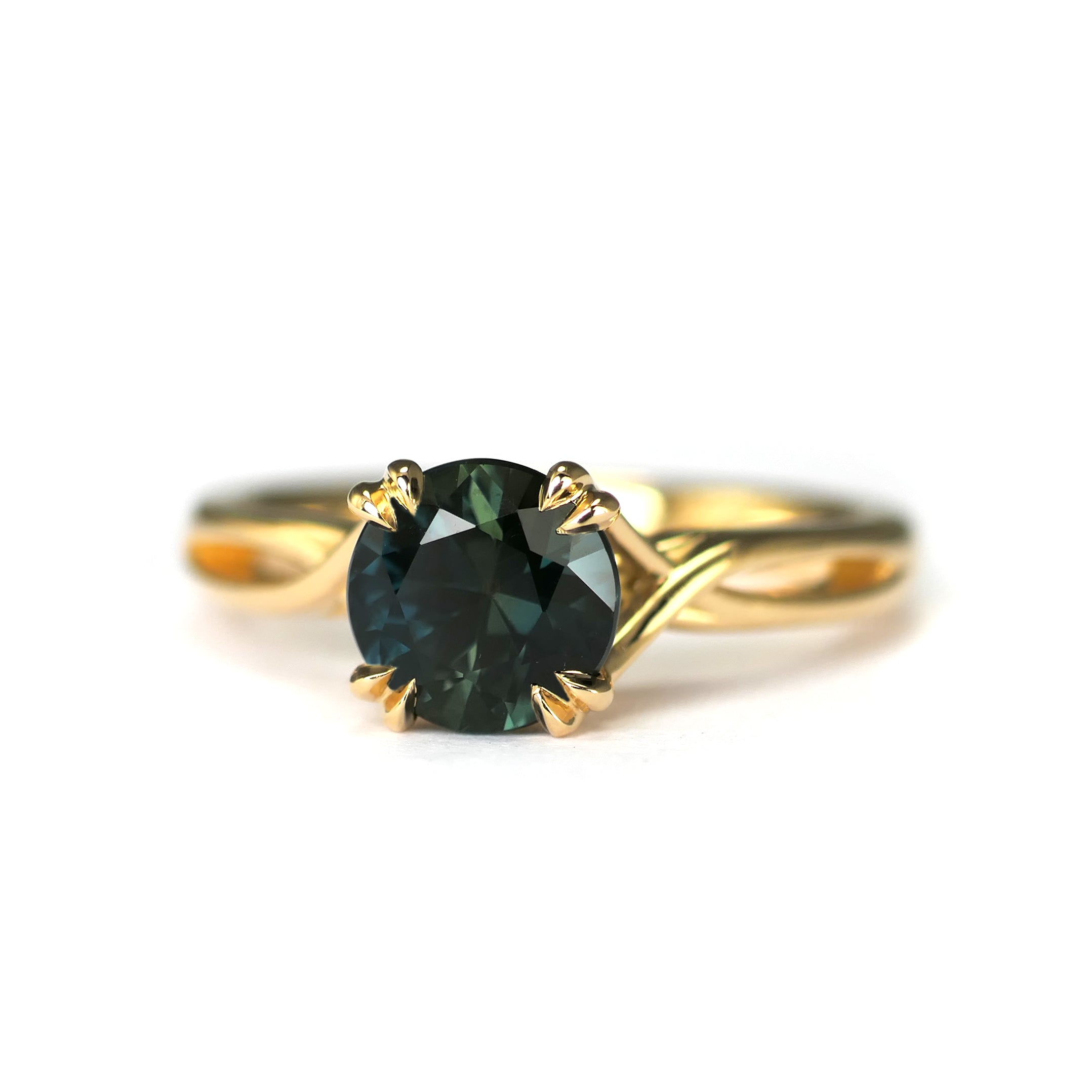 Teal Sapphire Criss Cross Solitaire – Made You Look Jewellery