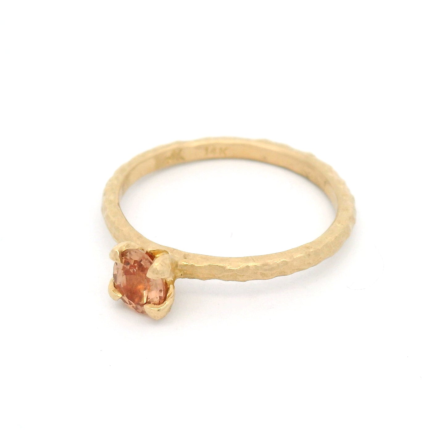 14K yellow gold organic solitaire engagement ring with claw-set natural 0.46ct oval peach sapphire and sculptural organic design.