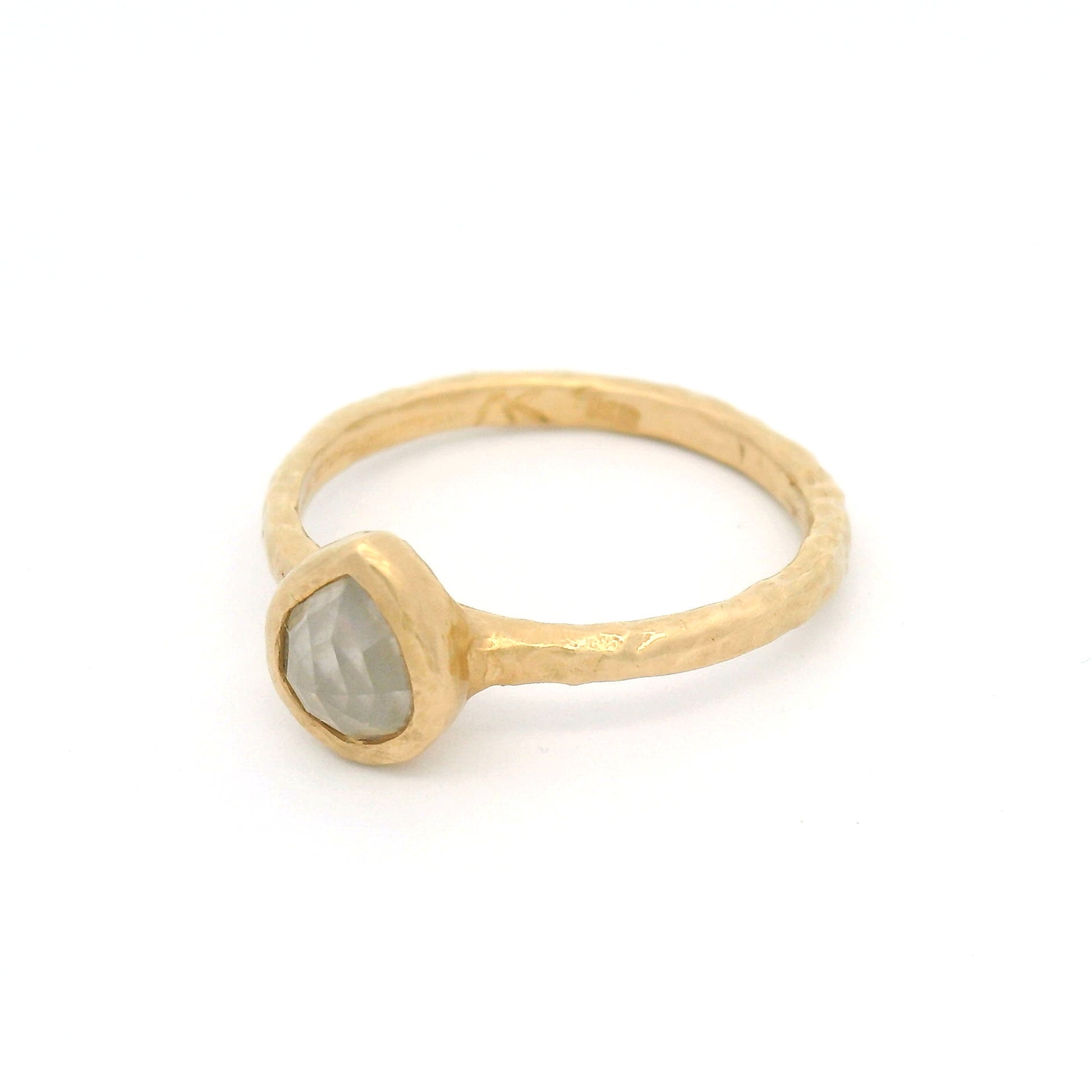 14K yellow gold engagement ring with bezel-set 0.85ct natural rose-cut pear-shaped icy diamond in a handcrafted solitaire setting.