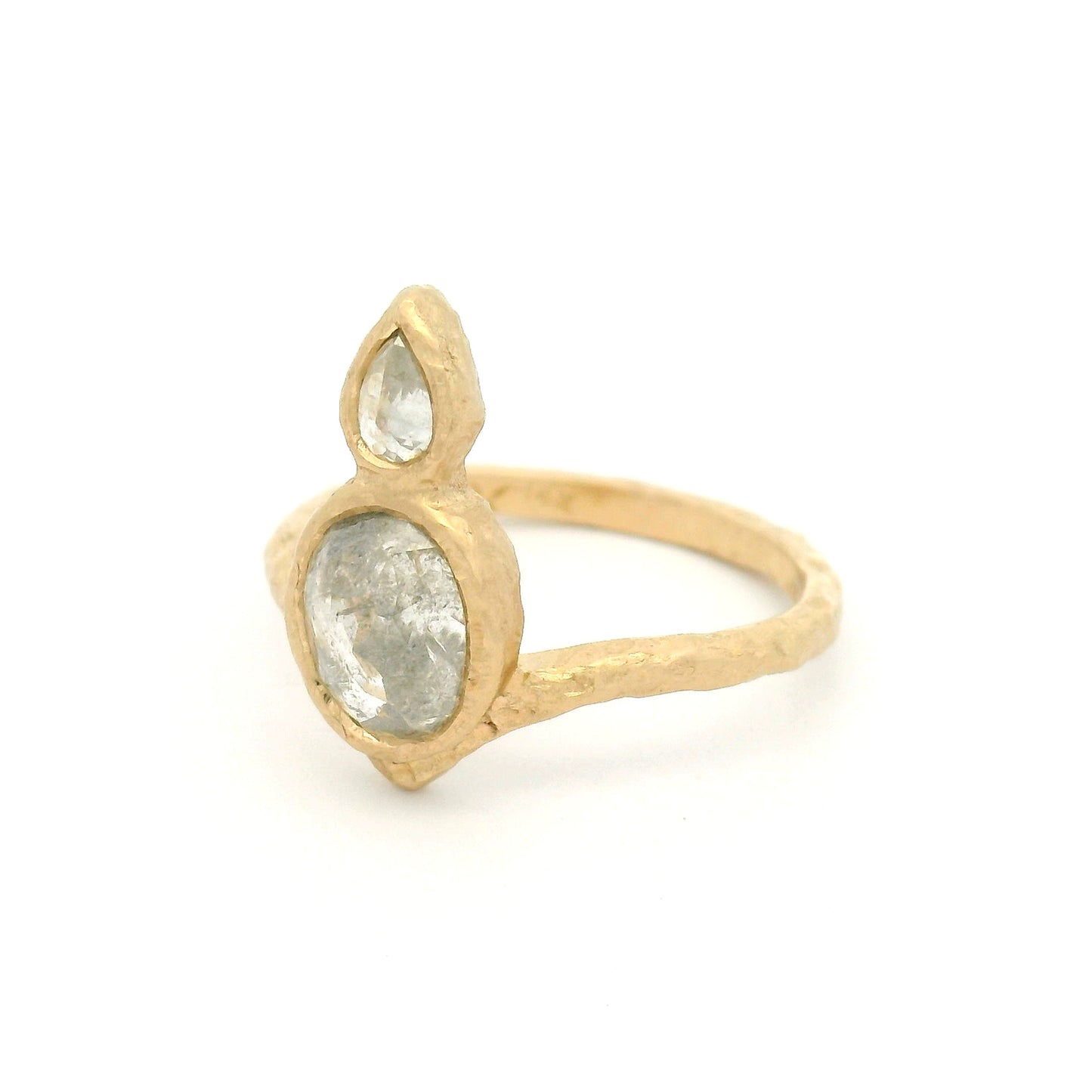 14K yellow gold organic Chevron ring with bezel-set 1.37ct oval rose-cut diamond and 0.15ct pear-shaped rose-cut diamond arranged vertically down the finger.