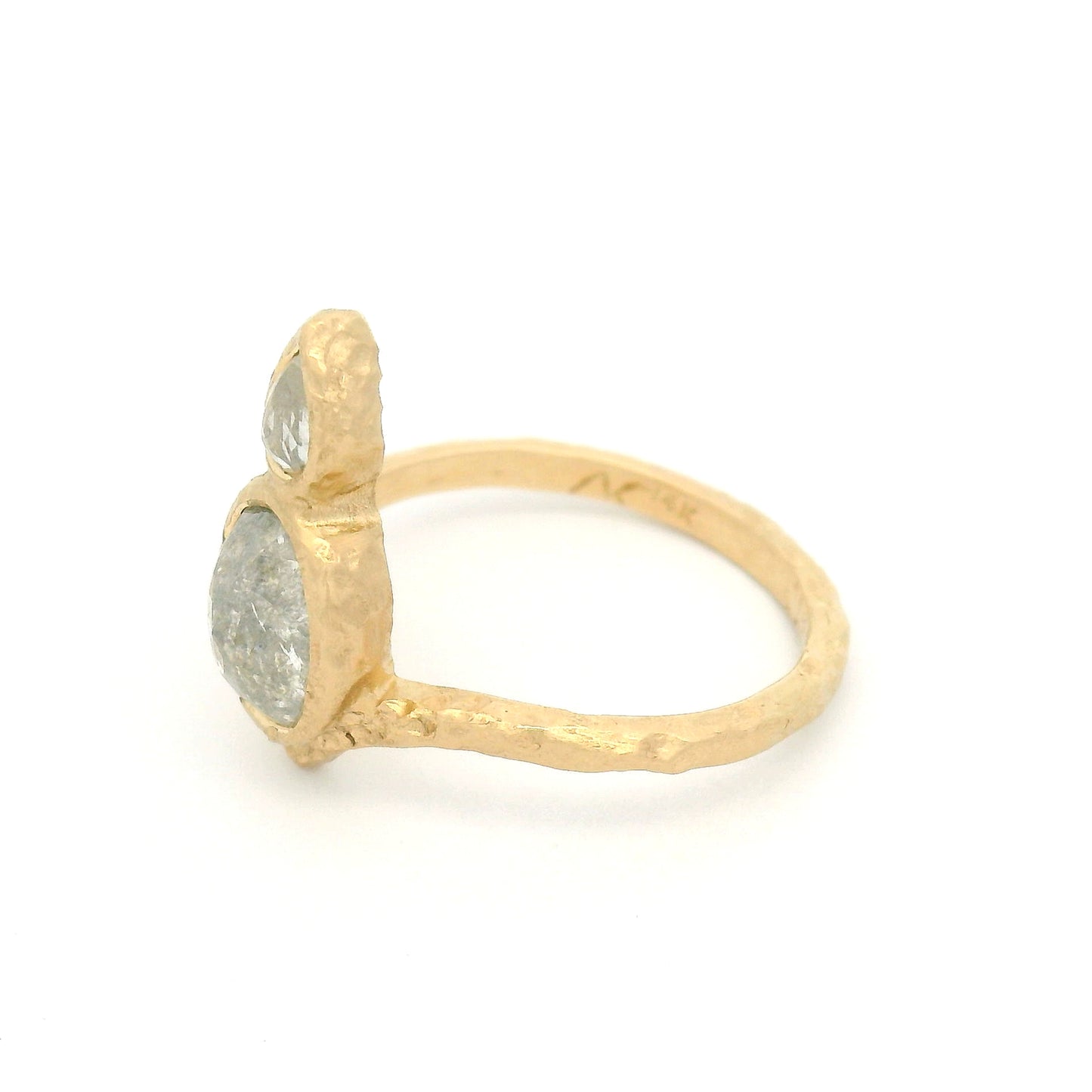 14K yellow gold organic Chevron ring with bezel-set 1.37ct oval rose-cut diamond and 0.15ct pear-shaped rose-cut diamond arranged vertically down the finger.