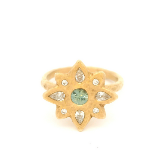 14k yellow organic ring set with a teal blue sapphire and diamond accents