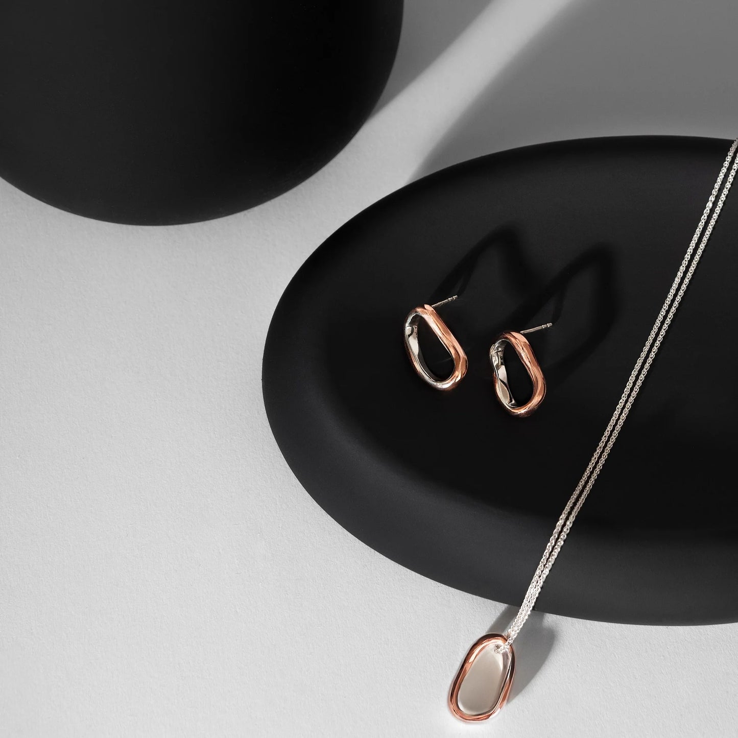 Silver and Copper Curve Loop Earrings