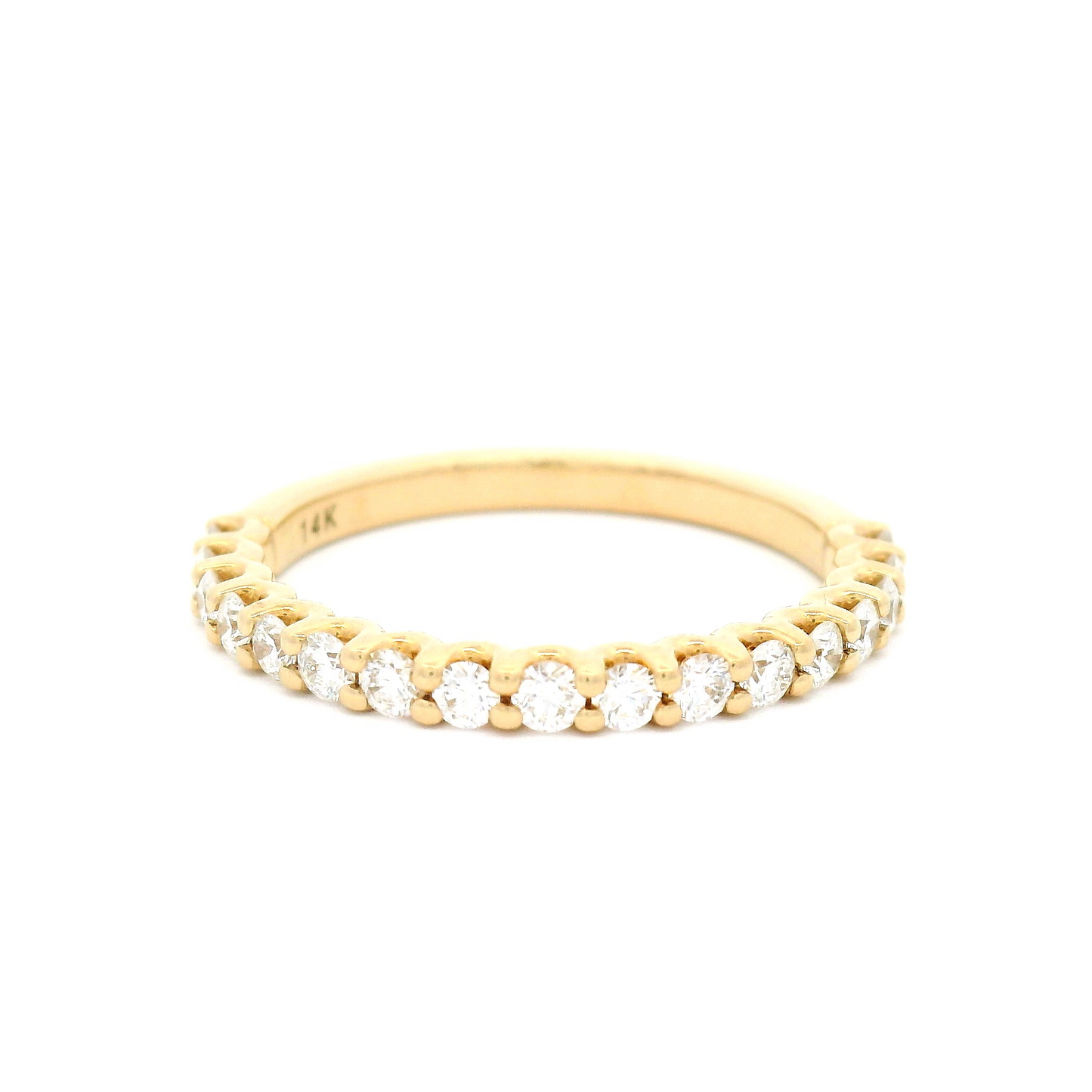 14k yellow ring with 0.425cts total weight of shared claw set diamonds.  Shown from a angle.