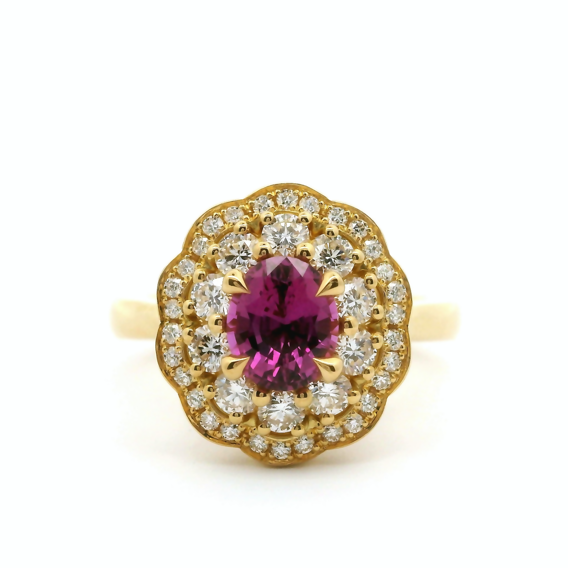 18k yellow ring with 1.06ct pink sapphire accented with diamonds.
