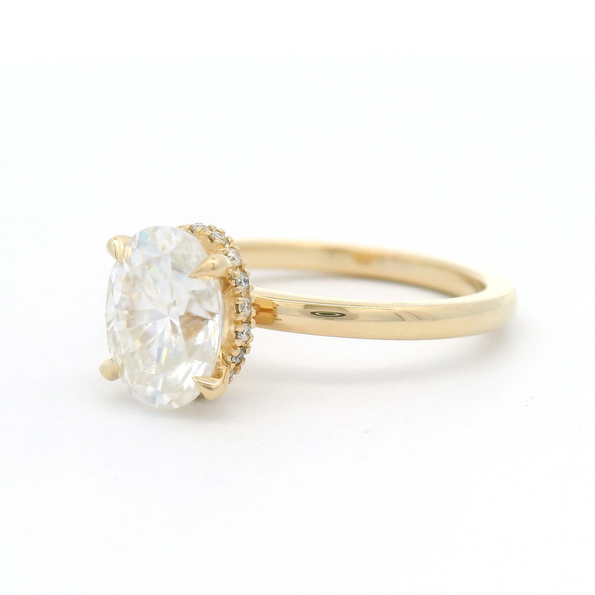 14k Yellow Solitaire with 1.77ct Oval Moissanite and Hidden Accent Lab Diamond Halo