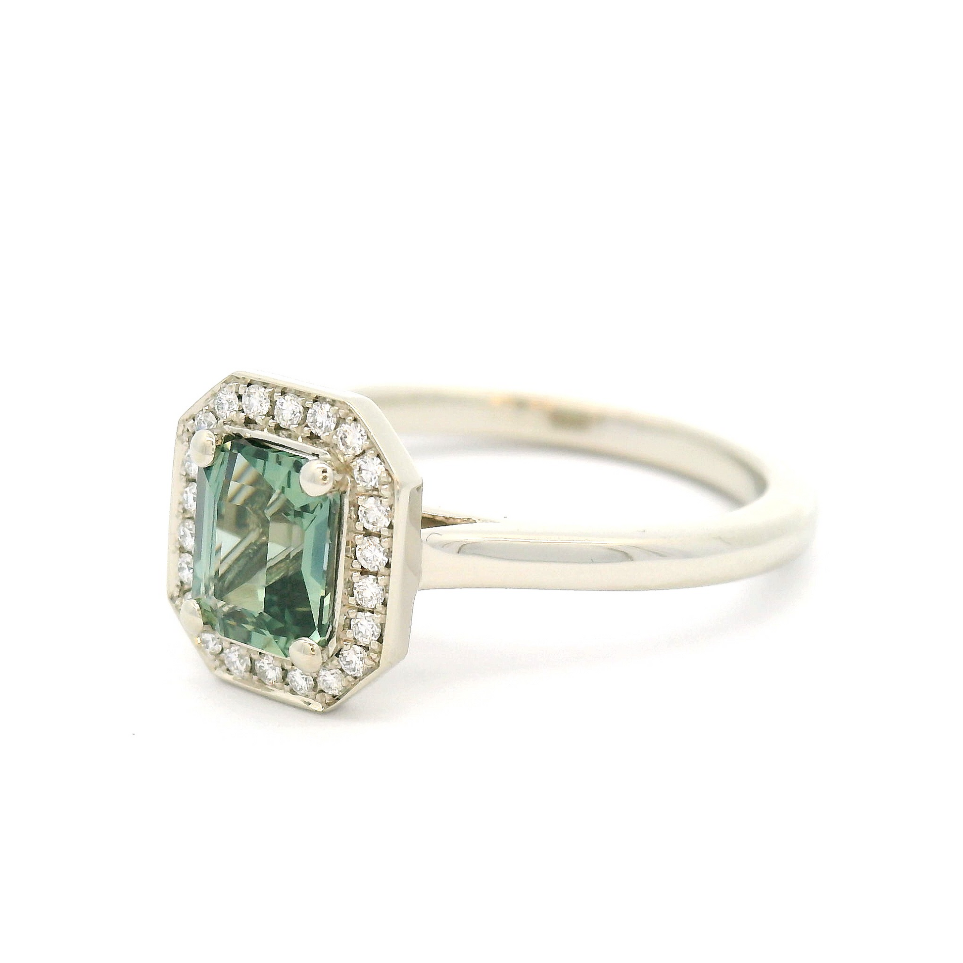 14k White Engagement Ring with 0.87ct Teal Sapphire and Accent Diamond Halo