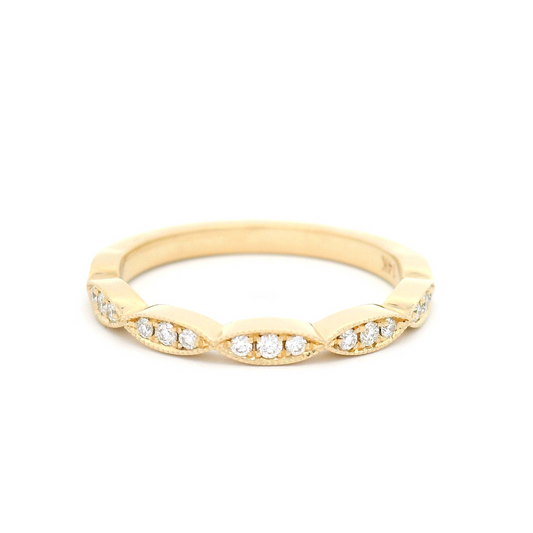 14k yellow ring with 0.16cts total weight of bead set diamonds with milgrain detail.