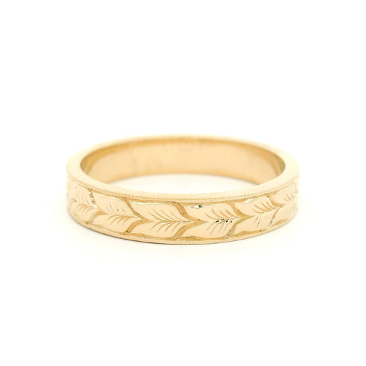 14K yellow gold 4mm flat profile band with hand-engraved aspen leaf pattern and milgrain edge detailing.