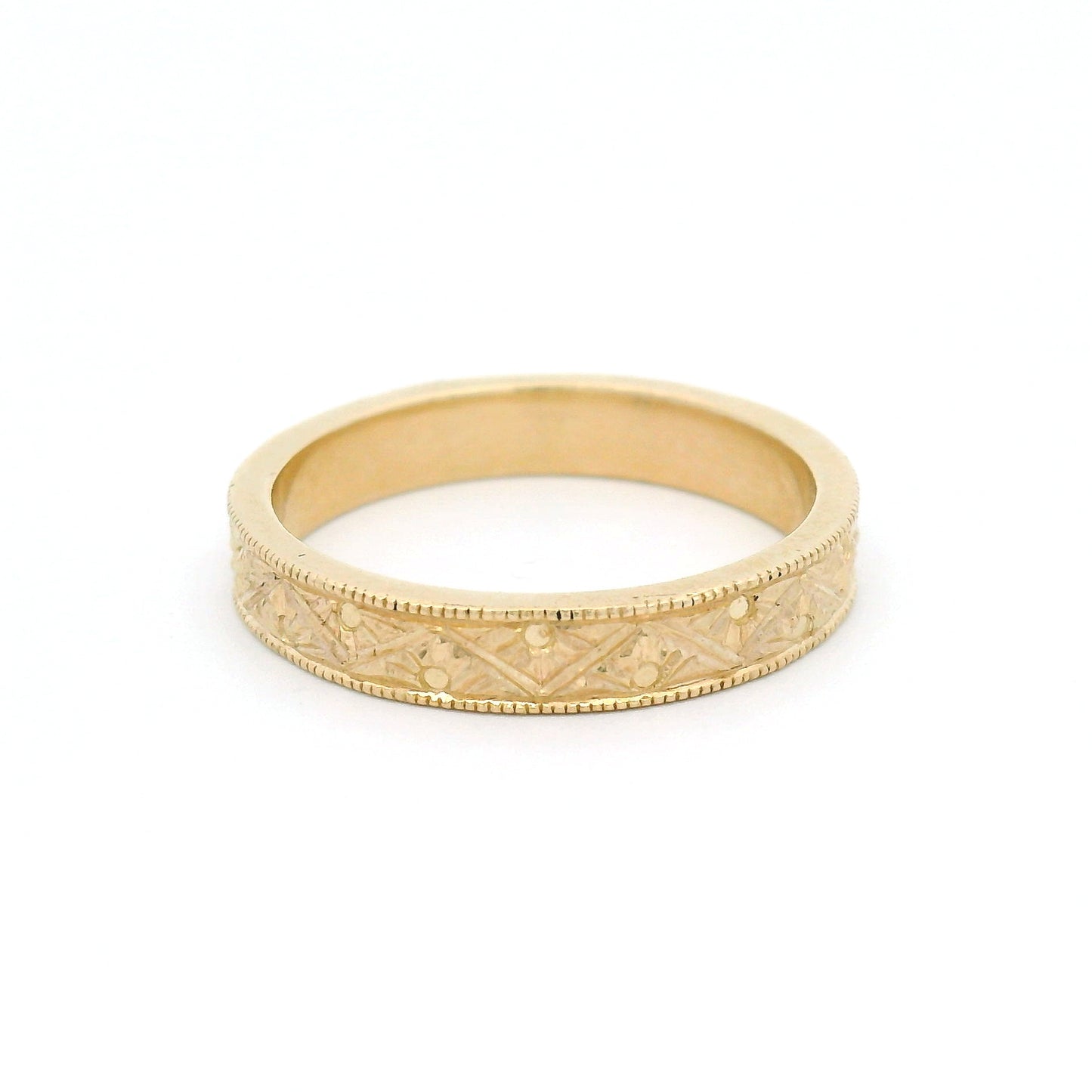 10K yellow gold 3mm flat profile band with engraved Art Deco triangle pattern and detailed sunburst motif