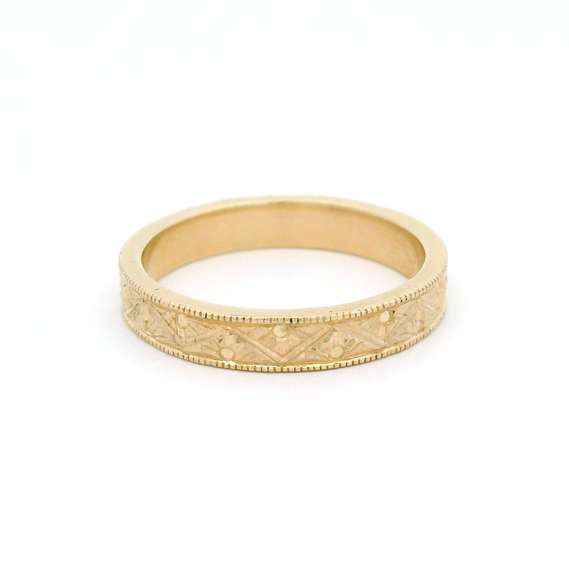 10K yellow gold 3mm flat profile band with engraved Art Deco triangle pattern and detailed sunburst motif