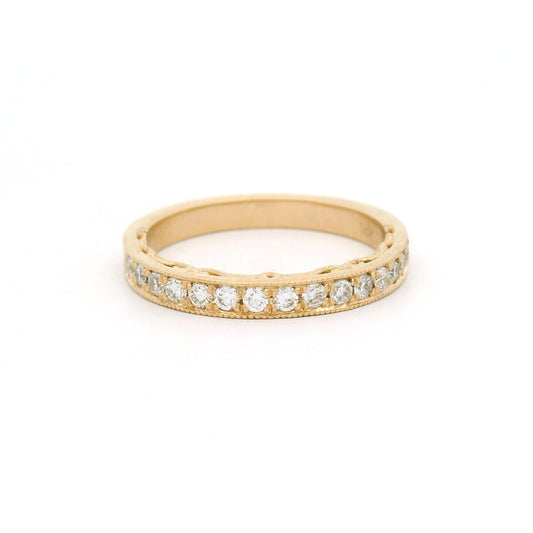 14K yellow gold half eternity wedding and anniversary band featuring 18 bead-set lab-grown round brilliant-cut diamonds totalling 0.33cts, milgrain edges and decorative scrollwork on the sides.