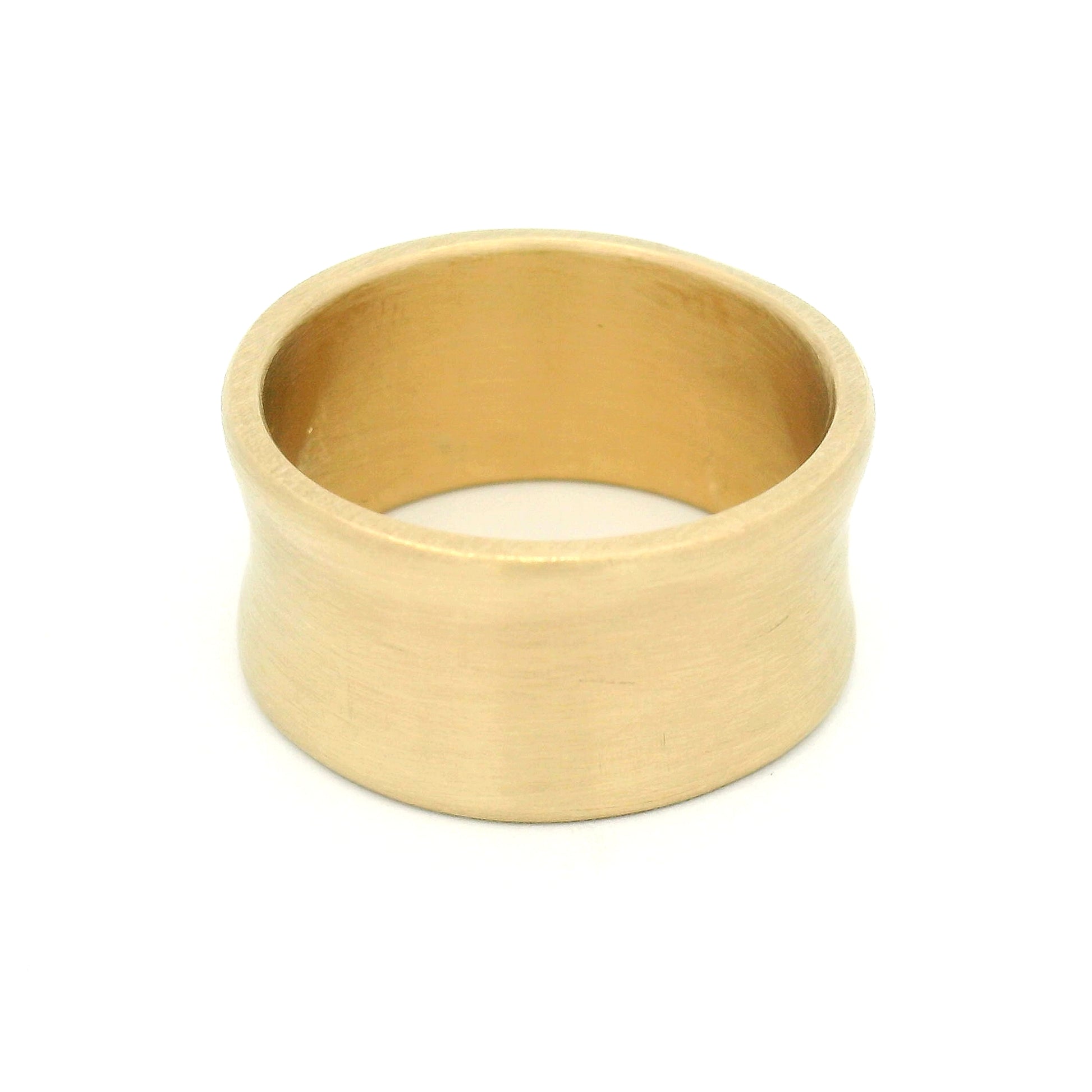 10K yellow gold 10mm wedding band with concave profile and soft satin finish, handcrafted with a modern minimalist design.