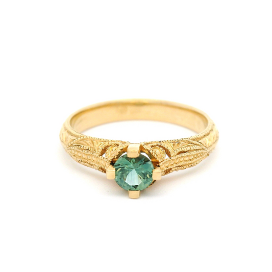 14k Yellow Engraved Teal Sapphire Ring.   Shown from the front.