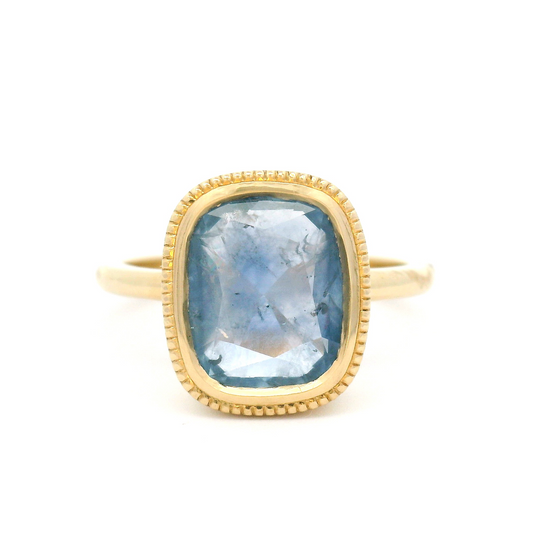 10k Yellow Bezel-Set Solitaire with 3.75ct Cushion-Cut Light Blue Sapphire Accented with Hand-Engraving