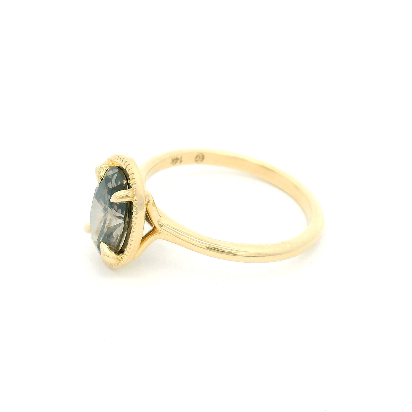 14K yellow gold solitaire engagement ring featuring a 1.55ct lab-grown oval-cut grey diamond in four-claw setting with milgrain edge and 1.8mm band.
