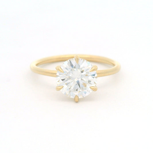 14K yellow gold handmade solitaire engagement ring with a 2.01ct (8.1mm) round brilliant-cut lab-grown diamond in a six-prong setting.