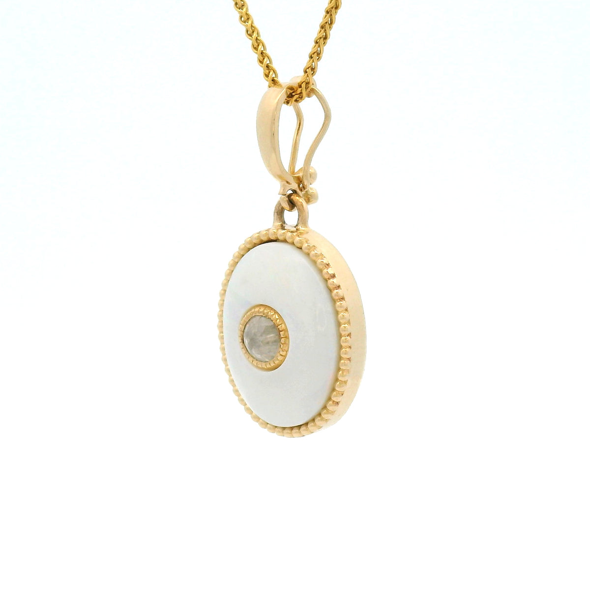 14K yellow gold pendant featuring a natural 1.15ct cabochon opal with a beaded bezel edge, centre-set 0.20ct rose-cut diamond and hinged bail.