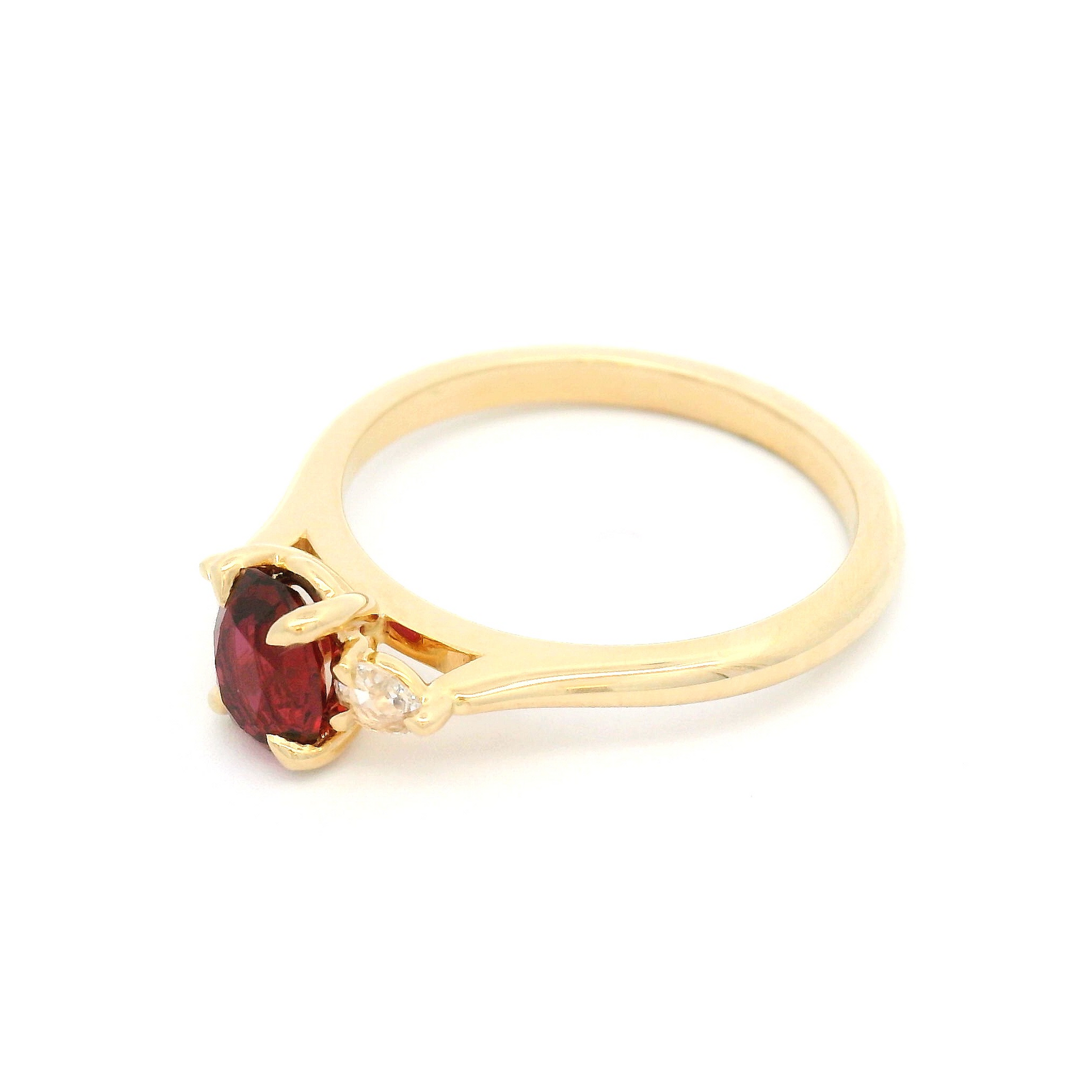 14k Yellow Engagement Ring with 0.70ct Oval Ruby & Pear Shape Diamond Accents
