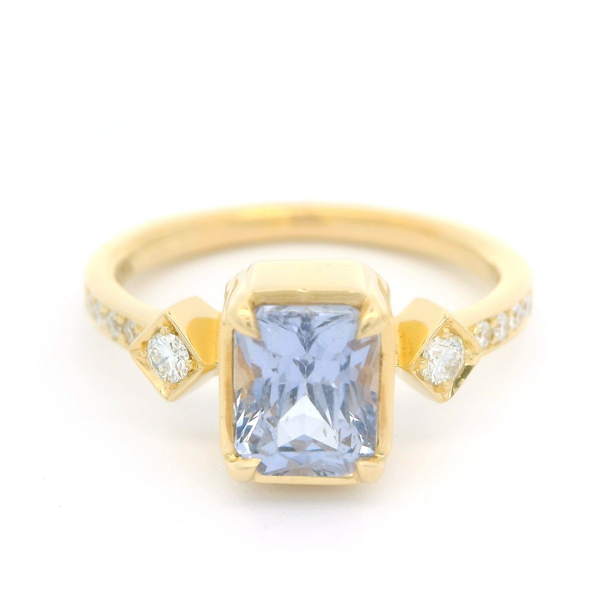 18k yellow ring 1.55ct lavender sapphire and accent diamonds.