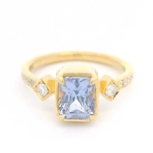 18k yellow ring 1.55ct lavender sapphire and accent diamonds.