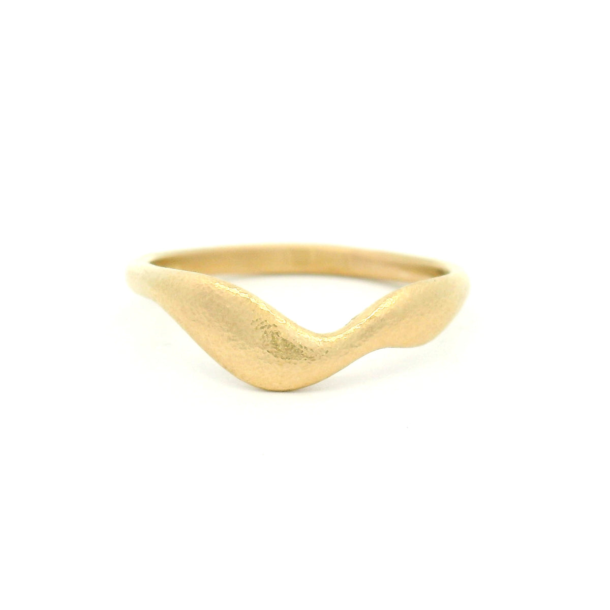 10K yellow gold wedding band with an organic textured surface and wobbly asymmetrical profile featuring free-flowing, sculptural contours.