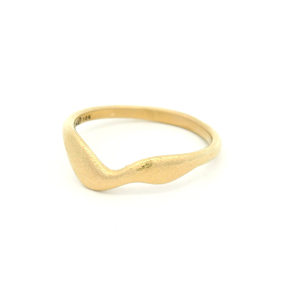 10K yellow gold wedding band with an organic textured surface and wobbly asymmetrical profile featuring free-flowing, sculptural contours.