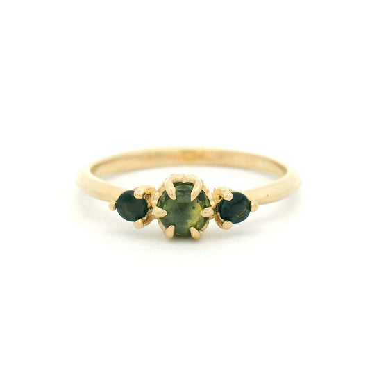 14K yellow gold organic three-stone ring with 0.38cts of natural green sapphires set in carved leaf-inspired settings.