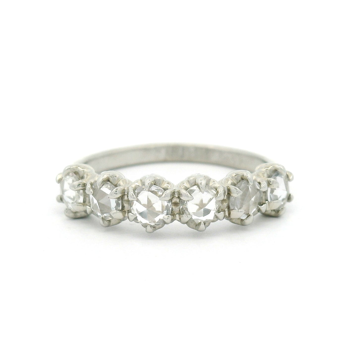 14K white gold six-stone band with six claw-set 3.5mm round rose-cut white sapphires on a softly domed 2mm band.