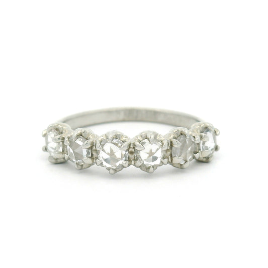14K white gold six-stone band with six claw-set 3.5mm round rose-cut white sapphires on a softly domed 2mm band.